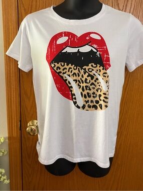 Rolling Stones copy of “Lick” with leopard print tongue